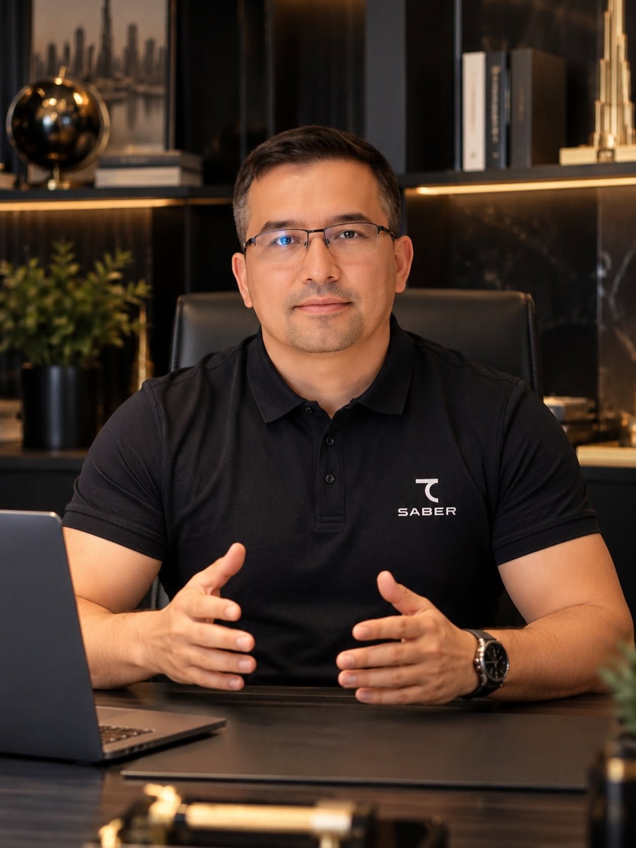 Dilshod Madaminov, founder of FERU Properties, at his desk